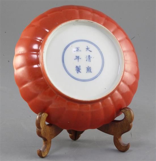A Chinese coral red ground petal lobed saucer dish, Republic period, diameter 16.6cm, small restored chip to rim
